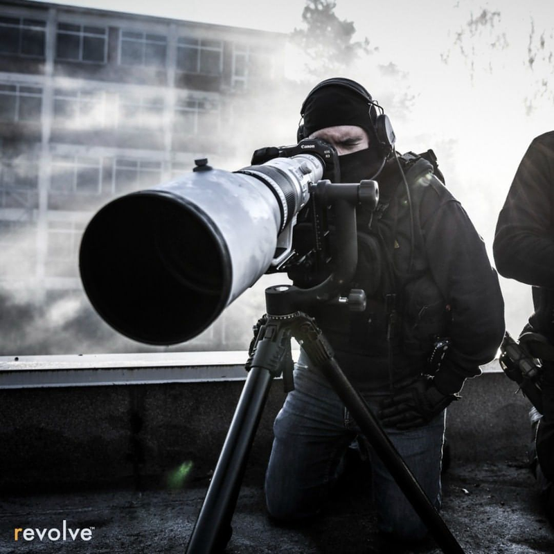 Load image into Gallery viewer, Action shot of Revolve&#39;s Tactical Tripod.
