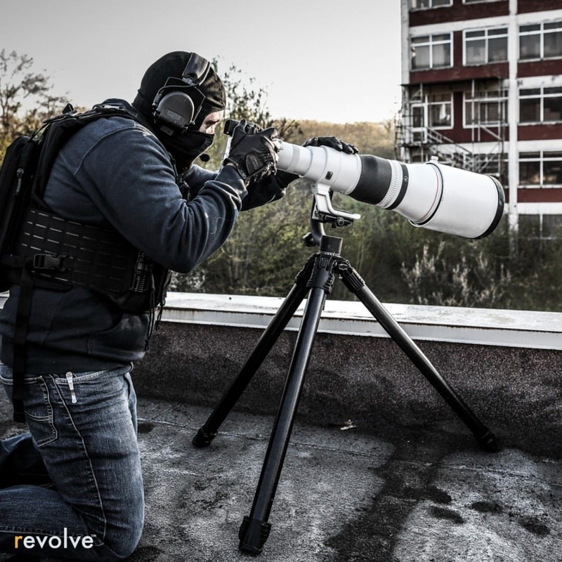 Load image into Gallery viewer, Spotting lens mounted on Revolve&#39;s Tactical Tripod, using the short legs.
